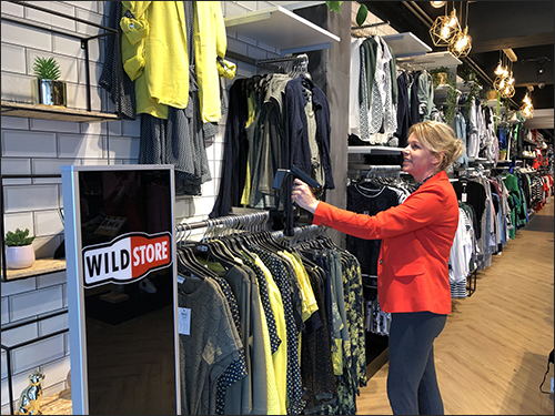 Employees utilize a handheld reader to read all tagged items in the store front.
